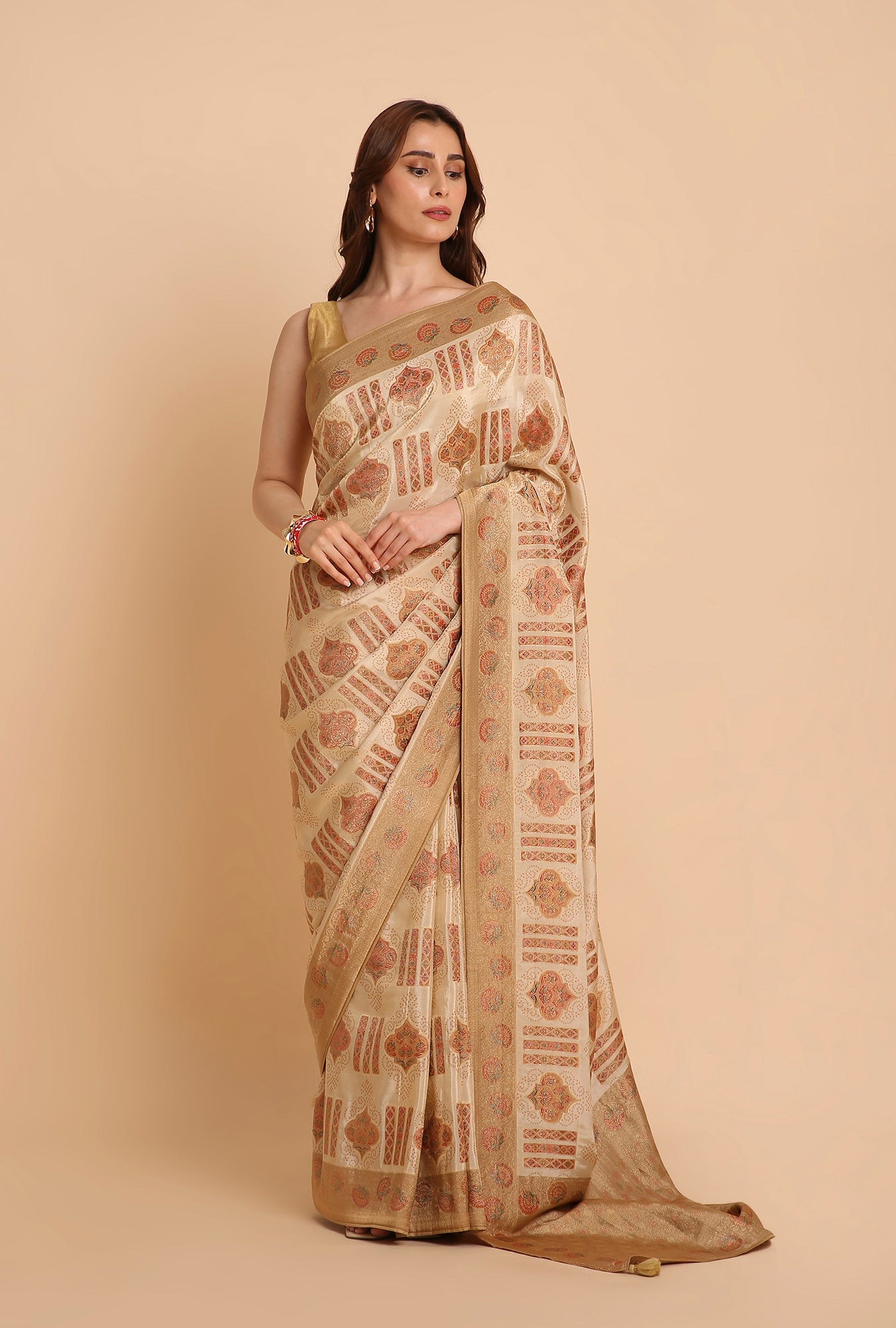 CREAM WITH GOLDEN BORDER FANCY RANKAT CRAPE SAREE