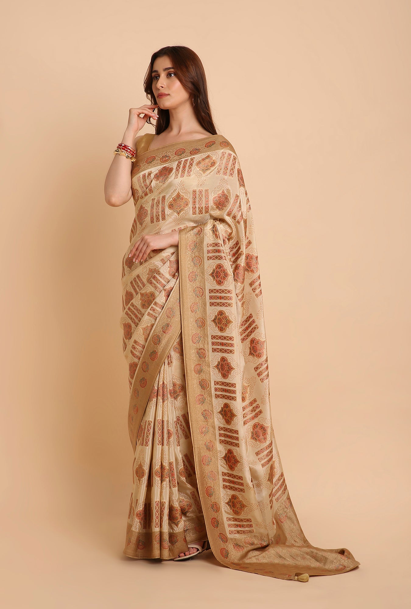 CREAM WITH GOLDEN BORDER FANCY RANKAT CRAPE SAREE