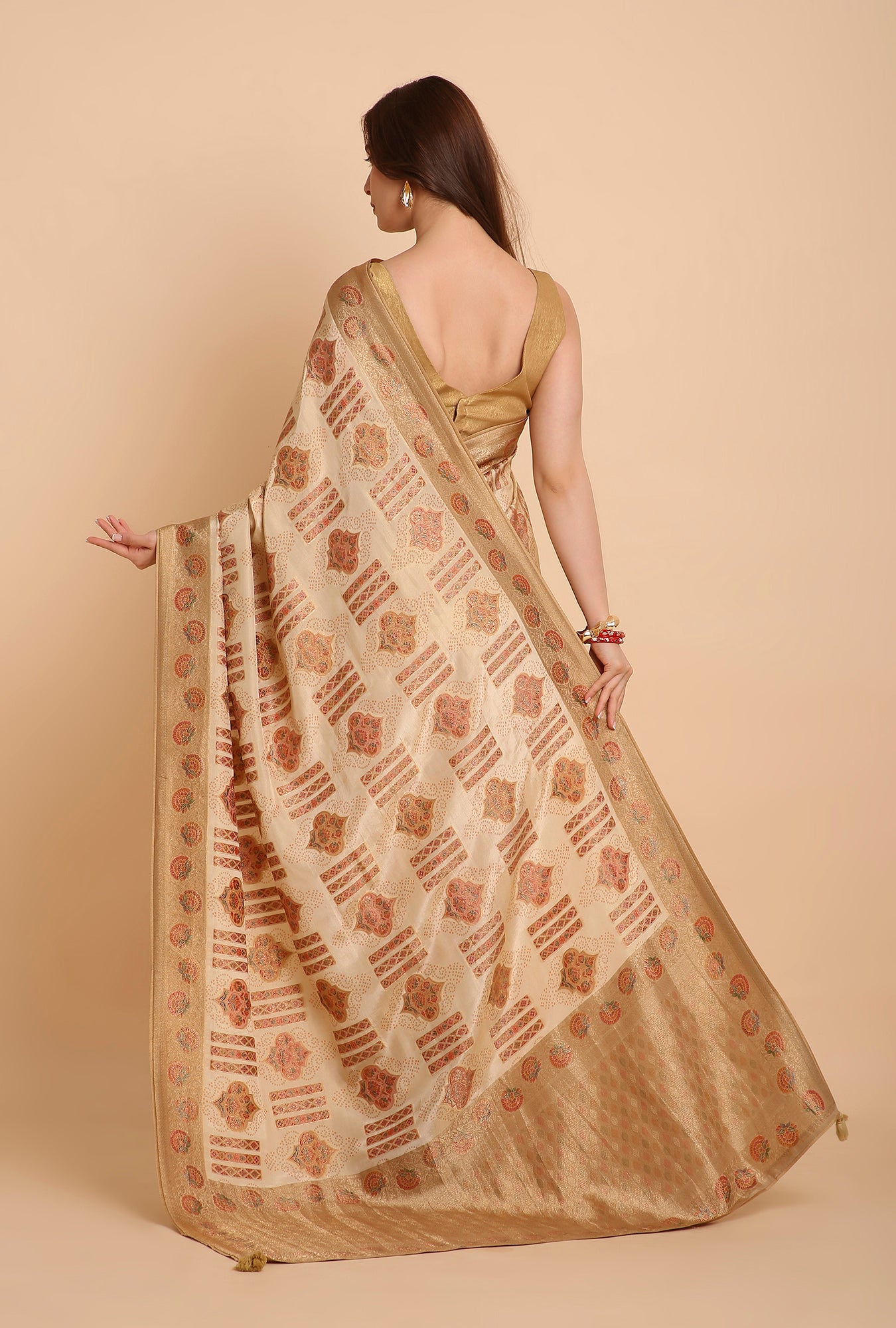 CREAM WITH GOLDEN BORDER FANCY RANKAT CRAPE SAREE