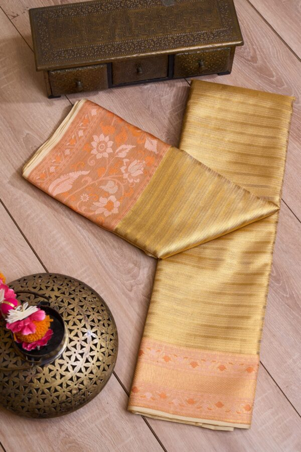 GODEN WITH PEACHIS ORANGE BOREDER KANCHIPURAM SILK SAREE