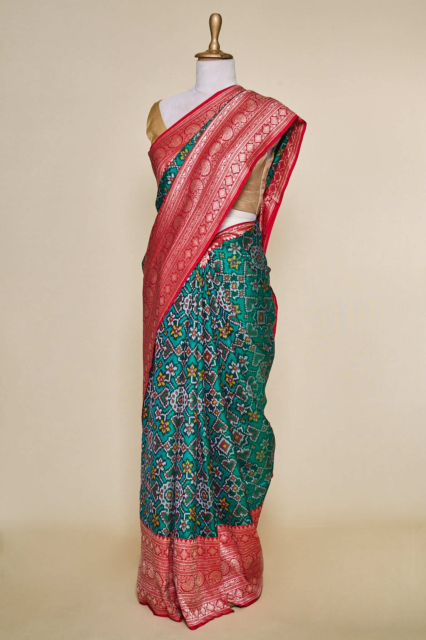 Hydrabad Green Patola With Red Georgette Pallu Border Signature Saree