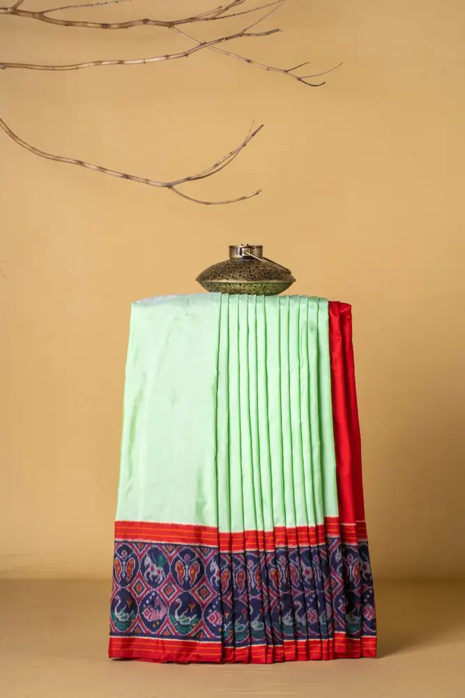 Pista Green & Blue Itkat Hydrabadi Patola Saree