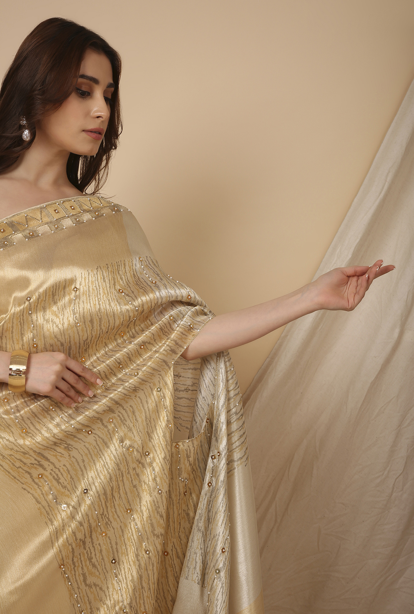 Gold silver with small pearl work signature saree