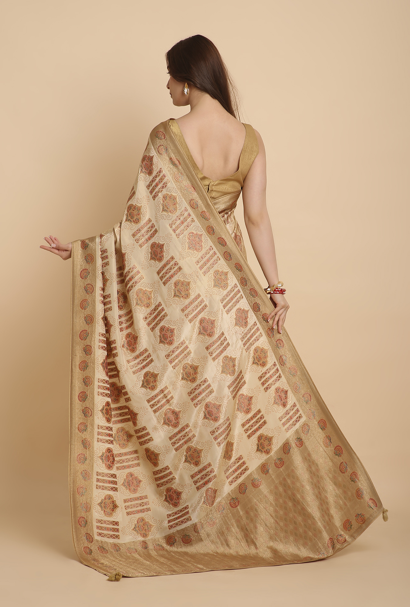 Cream with golden border fancy Rankat crape saree